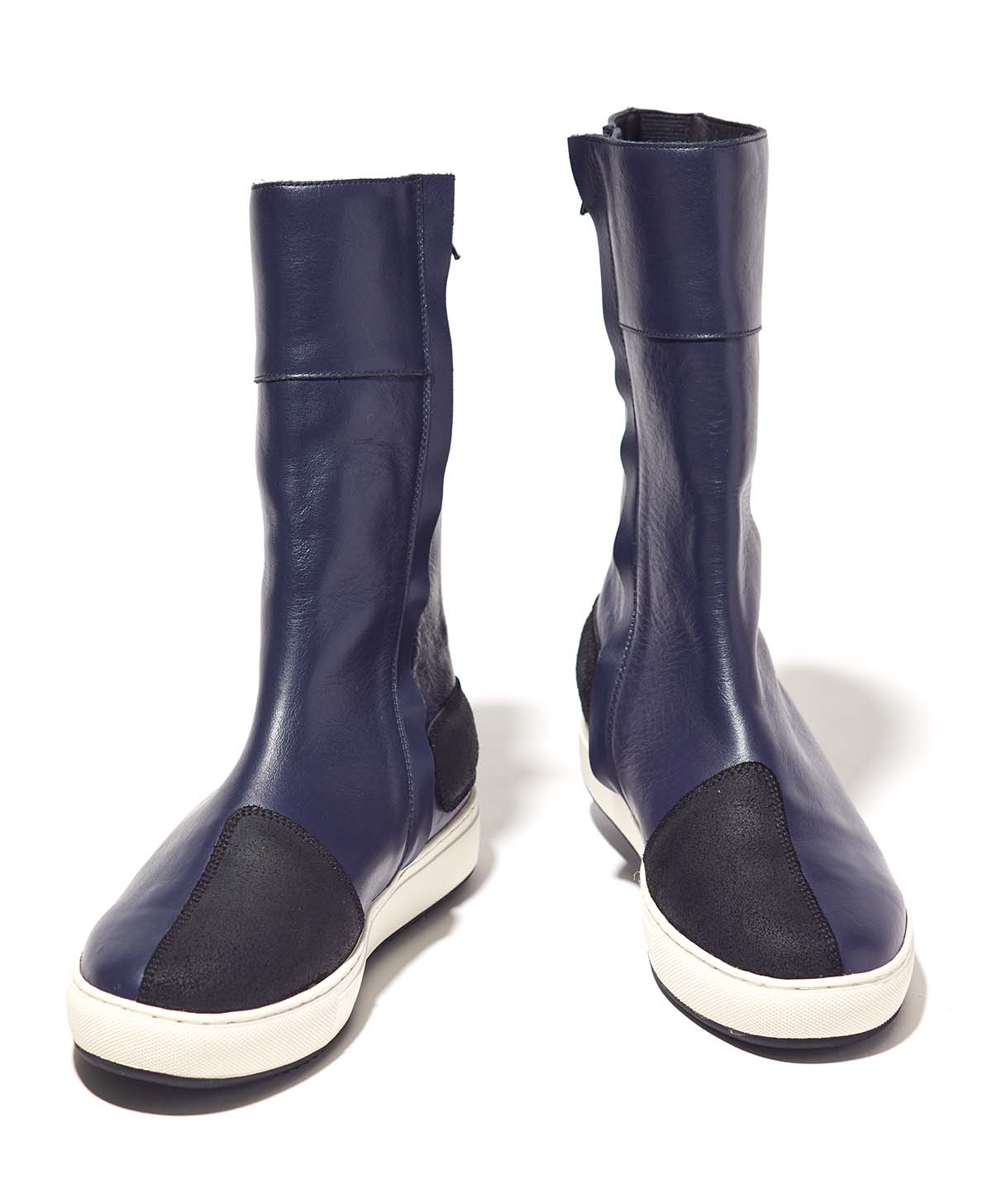 Zapatilla de cuero alta / azul marino / blanco (femenino)