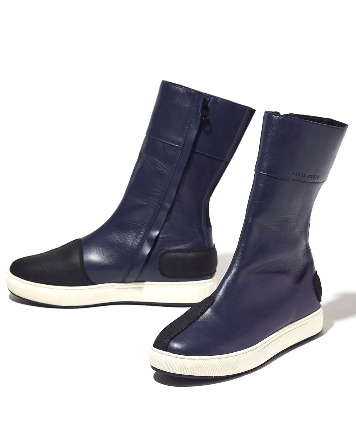 Zapatilla de cuero alta / azul marino / blanco (femenino)