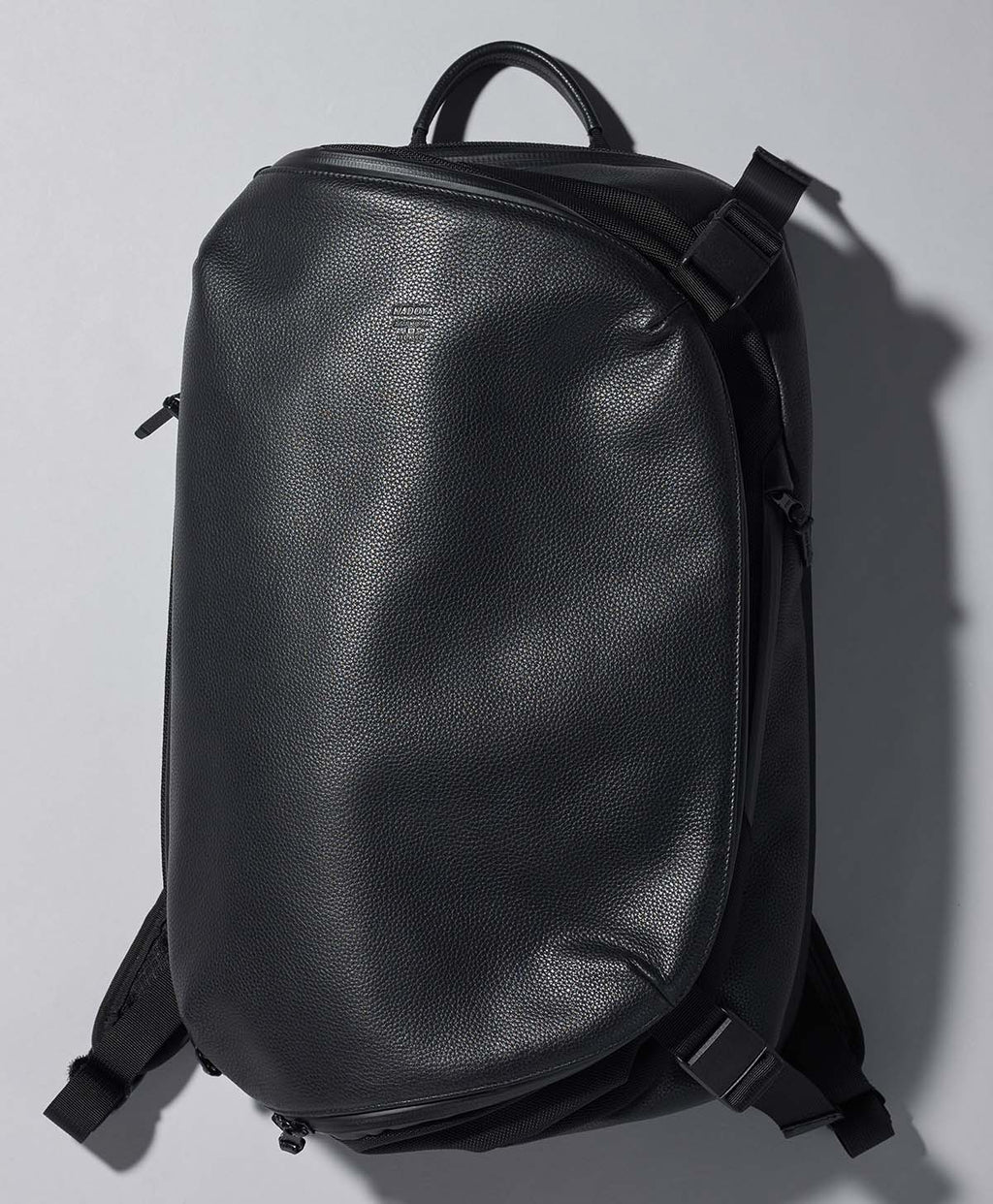 A new waterproof backpack with spinal pads that can fit a helmet 